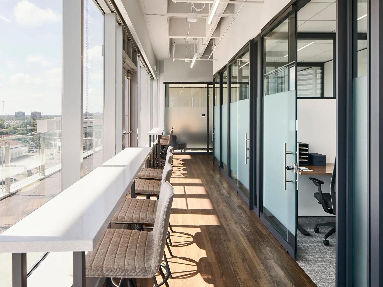 Modern professional office interior in Houston with skyline view
